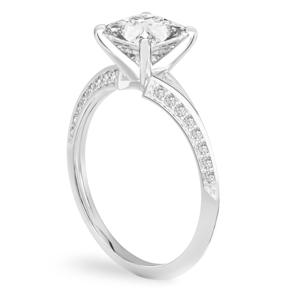 Angle view of princess cut diamond split shank knife edge engagement ring in palladium