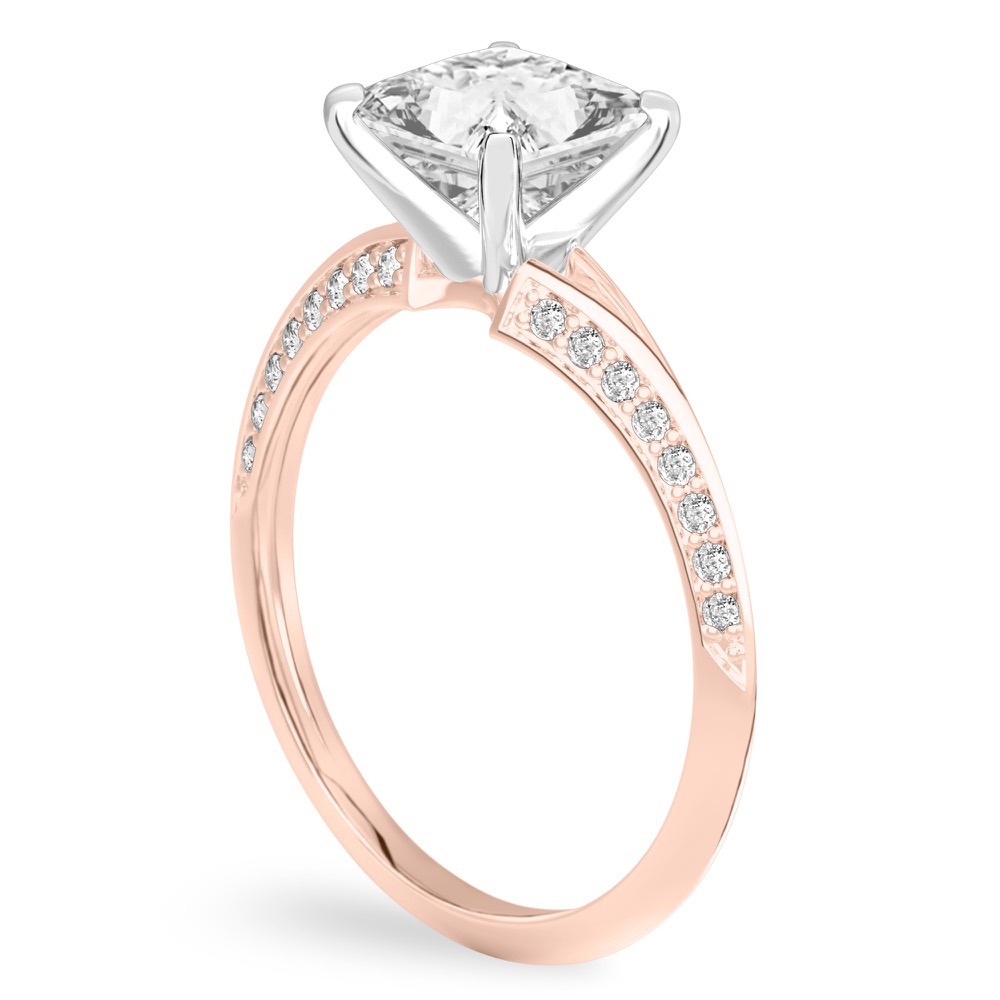 Angle view of princess cut diamond split shank knife edge engagement ring in rose gold