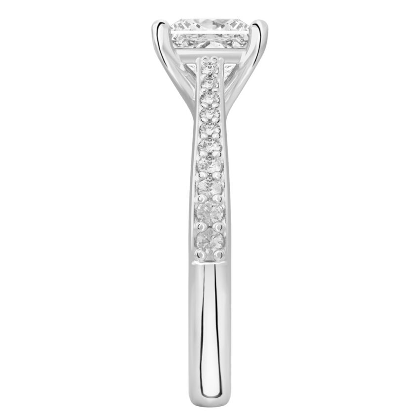 Side view of princess cut diamond tapered engagement ring in white gold