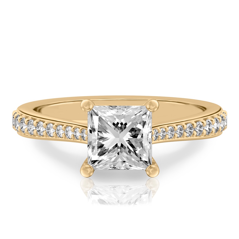 princess cut diamond tapered engagement ring in yellow gold