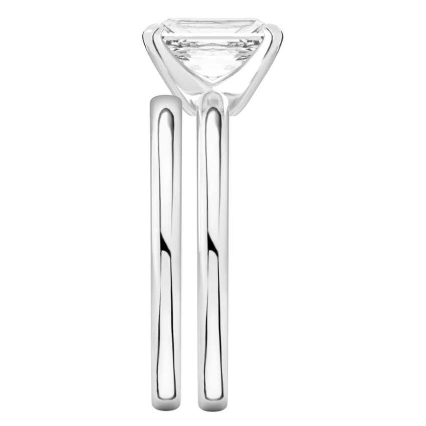 Side view of radiant cut diamond classic solitaire engagement ring set palladium