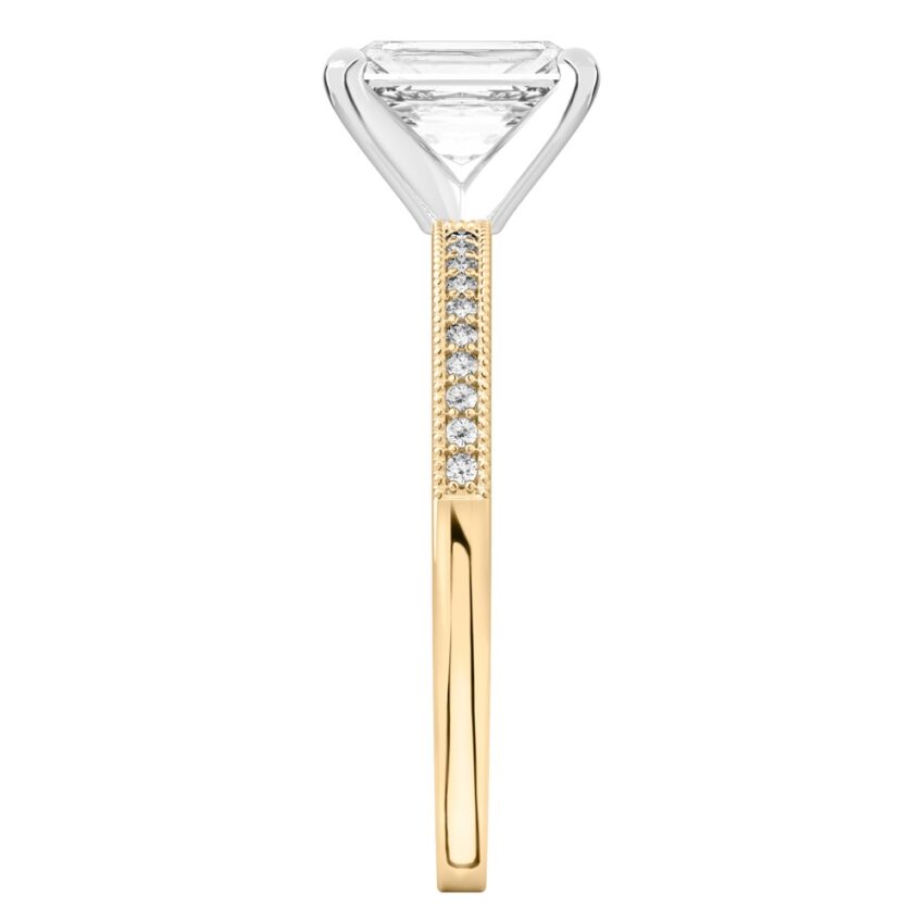 Side view of radiant cut diamond petite milgrain diamond engagement ring in yellow gold