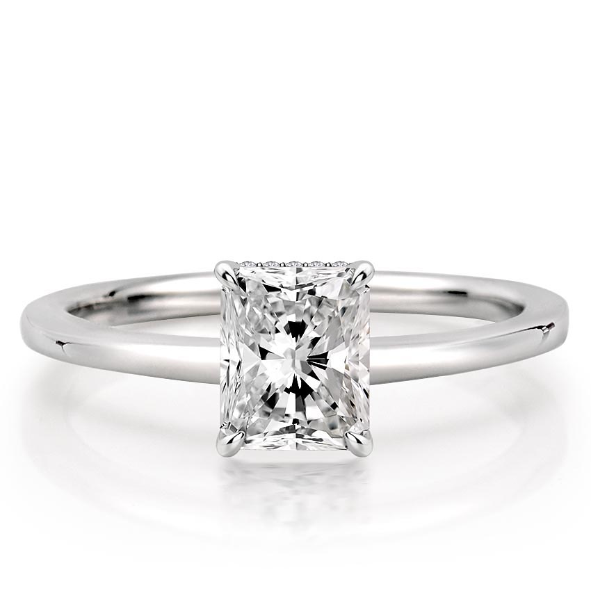 radiant cut diamond secret halo engagement ring in platinum