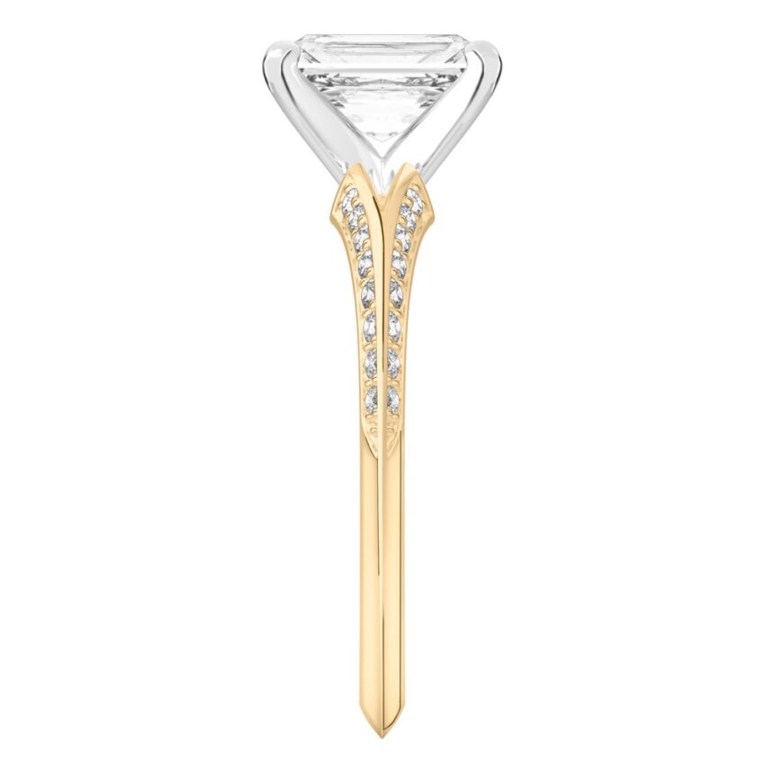 Side view of radiant cut diamond split shank knife edge engagement ring in yellow gold