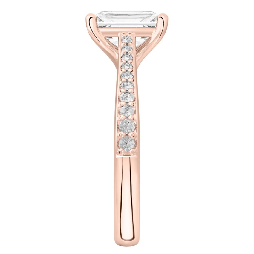 Side view of radiant cut diamond tapered engagement ring in rose gold