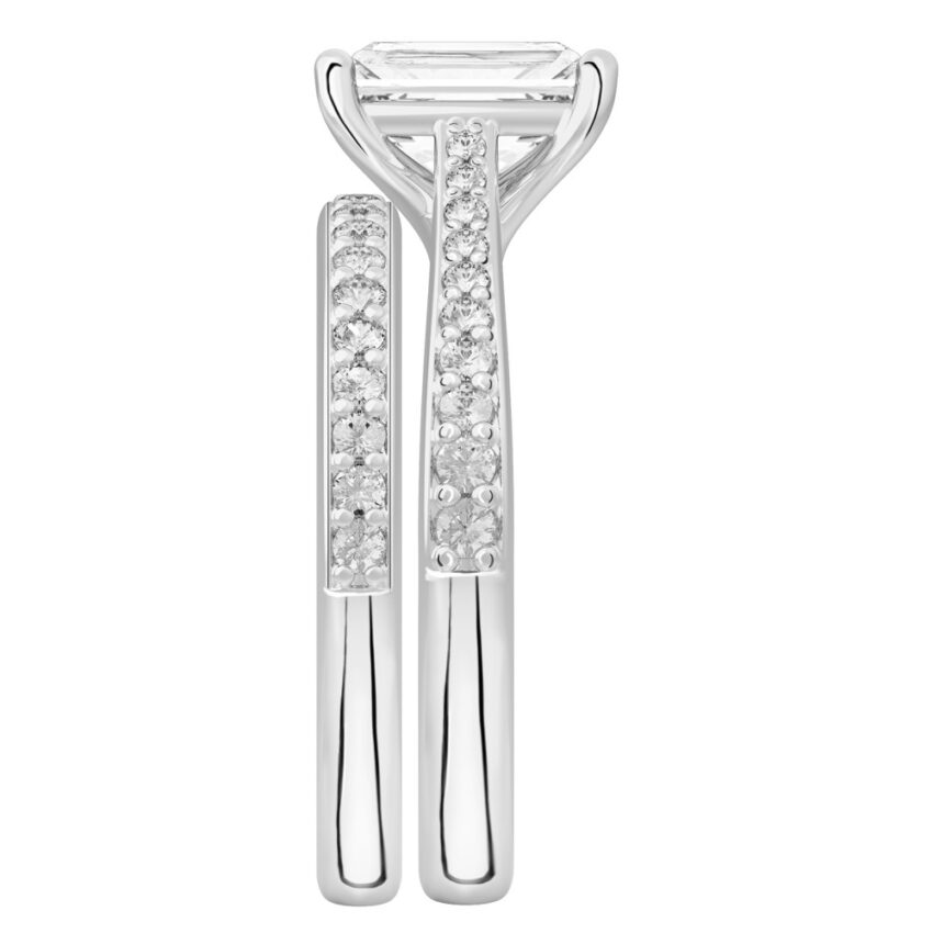 Side view of radiant cut diamond tapered engagement ring set platinum