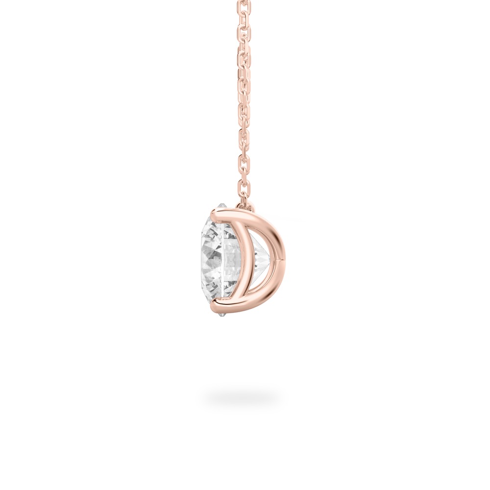 Side view of round cut diamond pendant necklace in rose gold