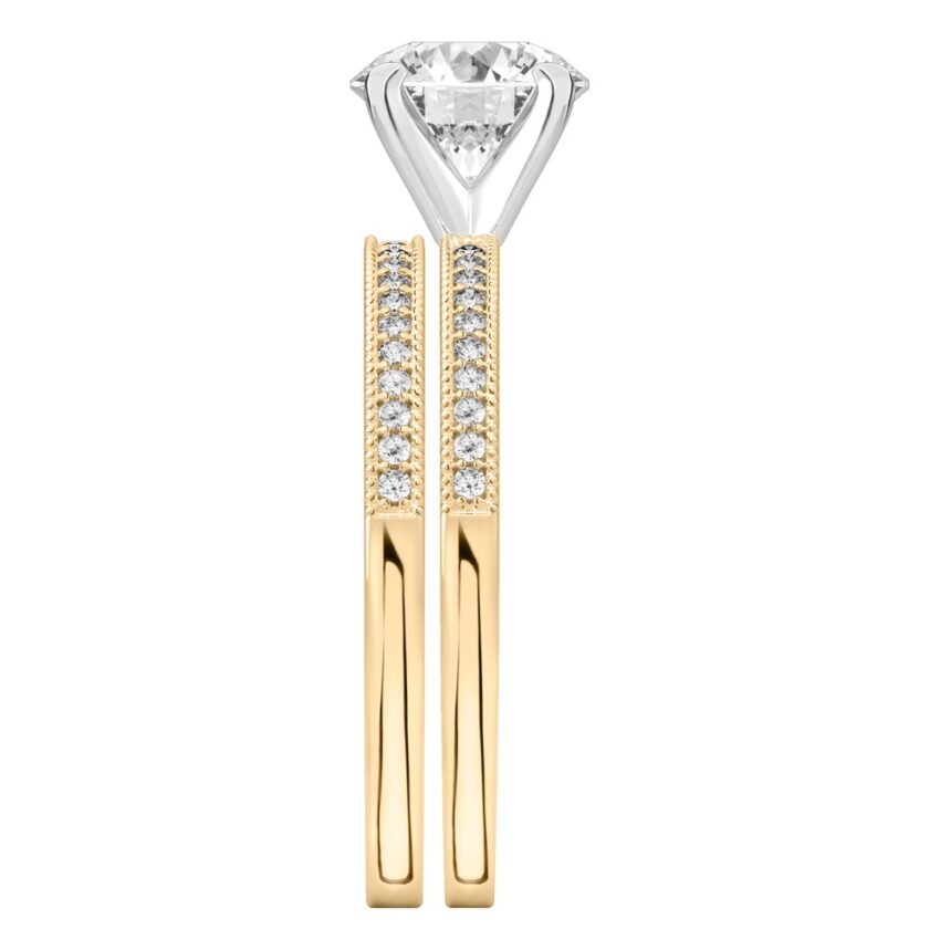 Side view of round cut diamond petite milgrain diamond engagement ring set yellow gold