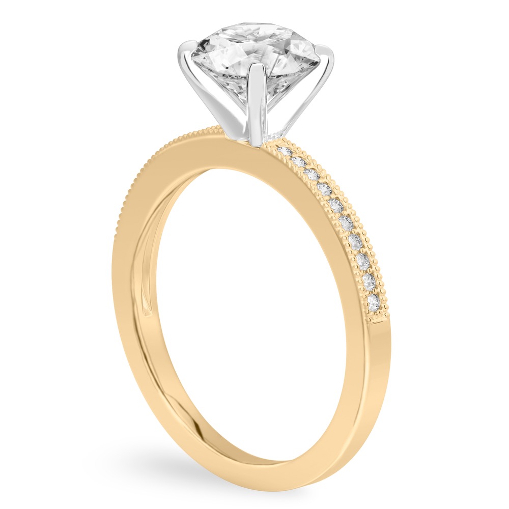 Angle view of round cut diamond petite milgrain diamond engagement ring in yellow gold