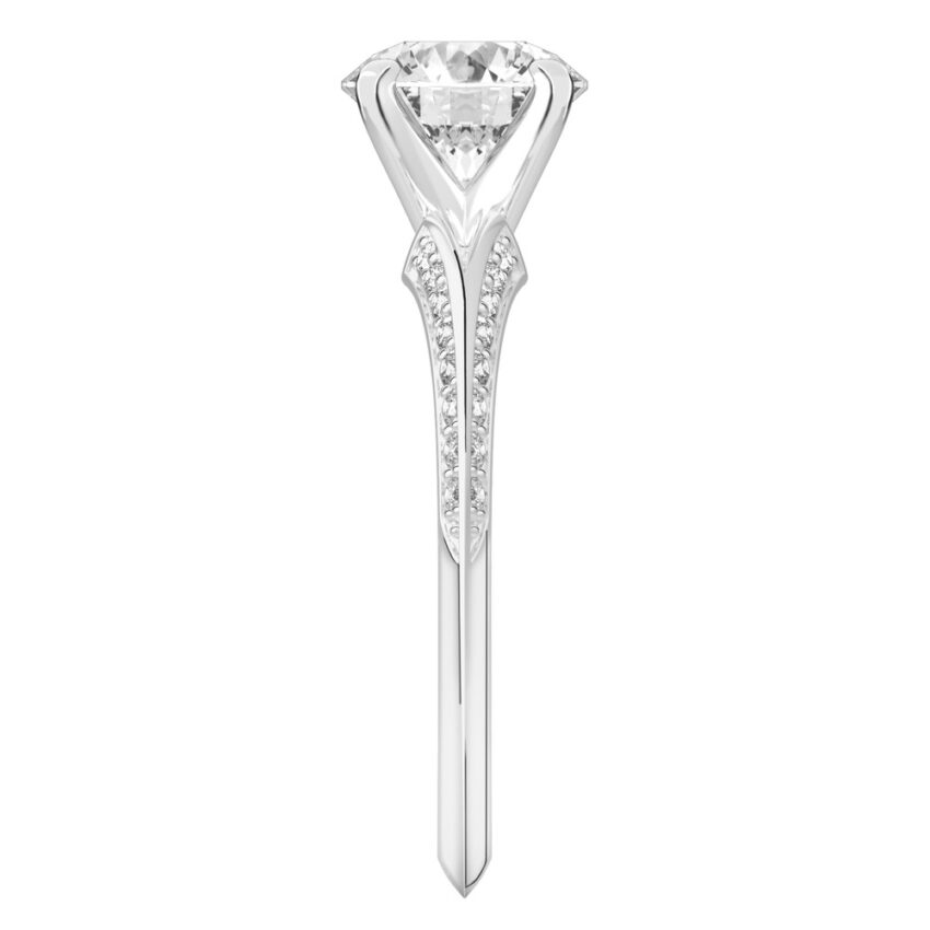 Side view of round cut diamond split shank knife edge engagement ring in platinum
