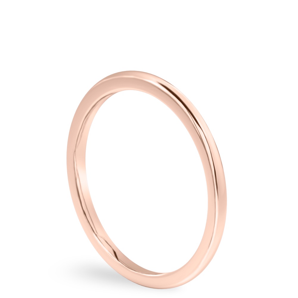 Angle view of simple wedding band in rose gold