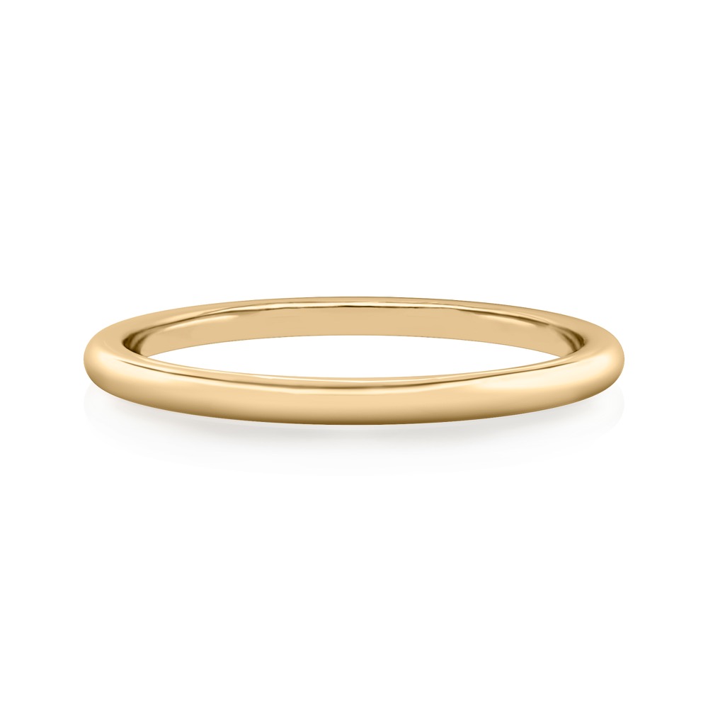 simple wedding band in yellow gold