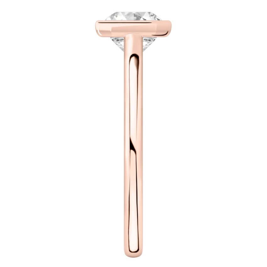 Side view of asscher cut diamond bezel engagement ring in rose gold