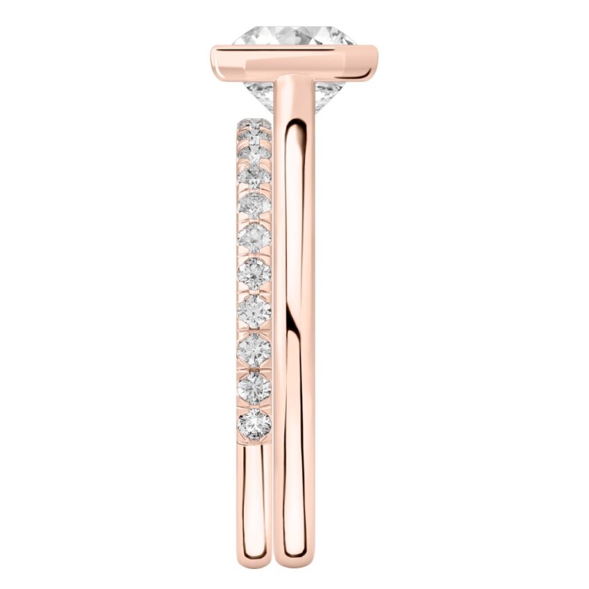 Side view of asscher cut diamond bezel engagement ring set rose gold