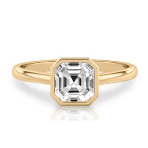 asscher cut diamond bezel engagement ring in yellow gold