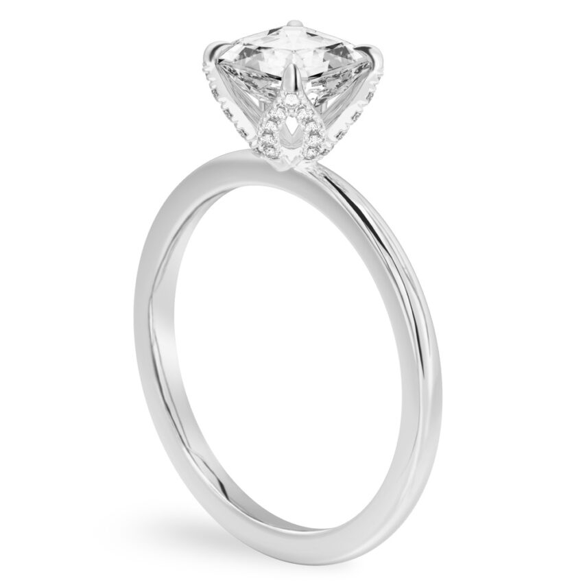 Angle view of asscher cut diamond pave petal prong engagement ring in platinum