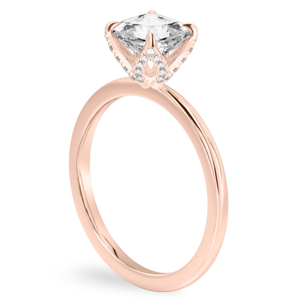 Angle view of asscher cut diamond pave petal prong engagement ring in rose gold