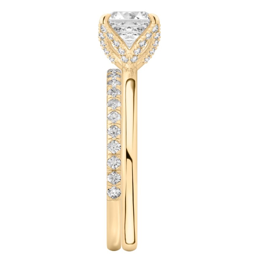 Side view of asscher cut diamond pave petal prong engagement ring set yellow gold