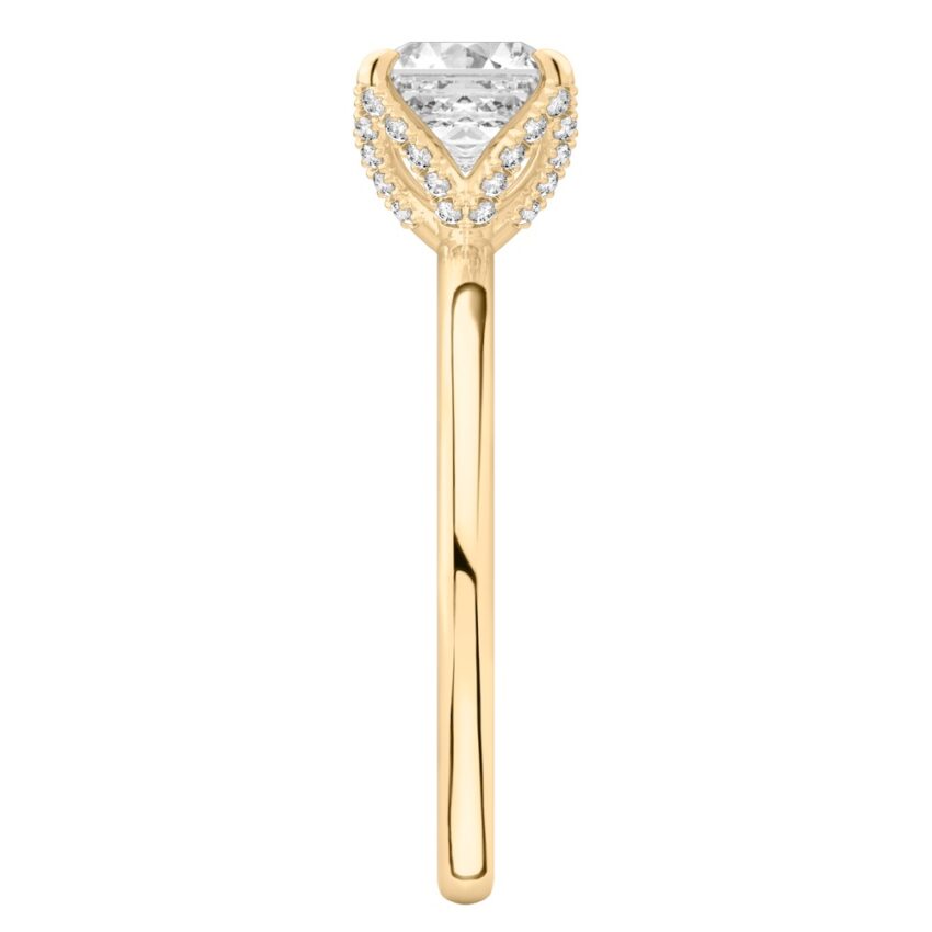 Side view of asscher cut diamond pave petal prong engagement ring in yellow gold
