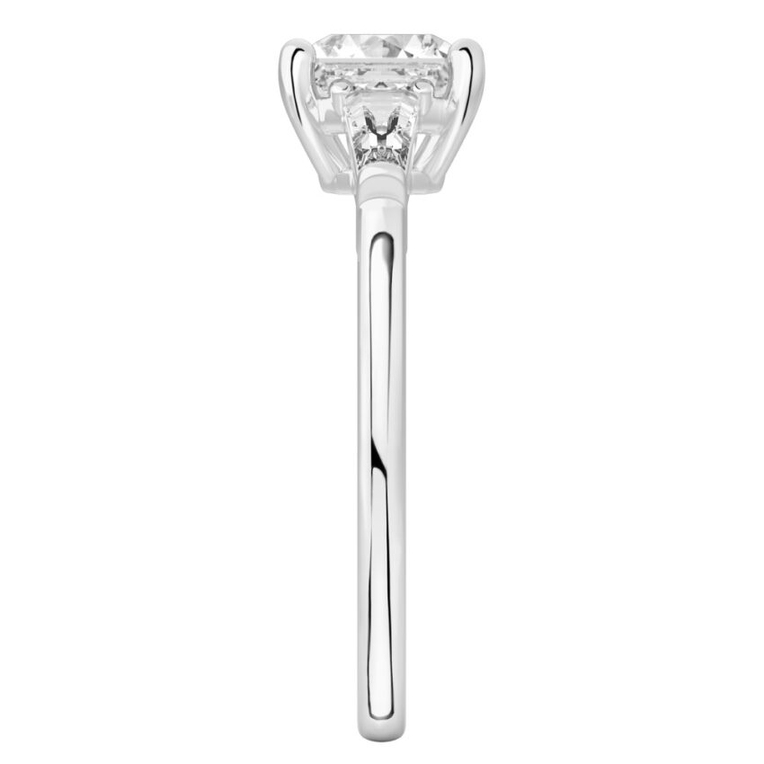 Side view of asscher cut diamond tapered baguette engagement ring in platinum