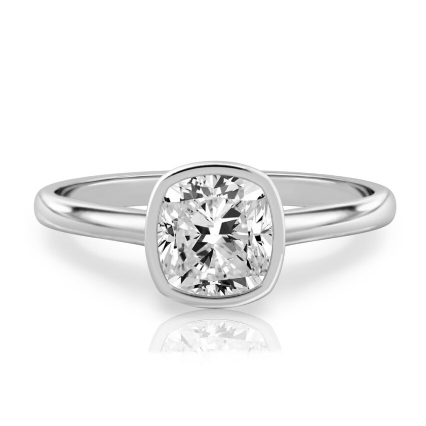 cushion cut diamond bezel engagement ring in palladium