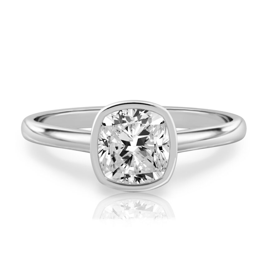 cushion cut diamond bezel engagement ring in white gold