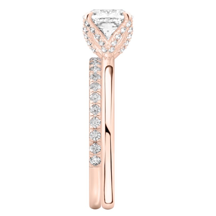Side view of cushion cut diamond pave petal prong engagement ring set rose gold