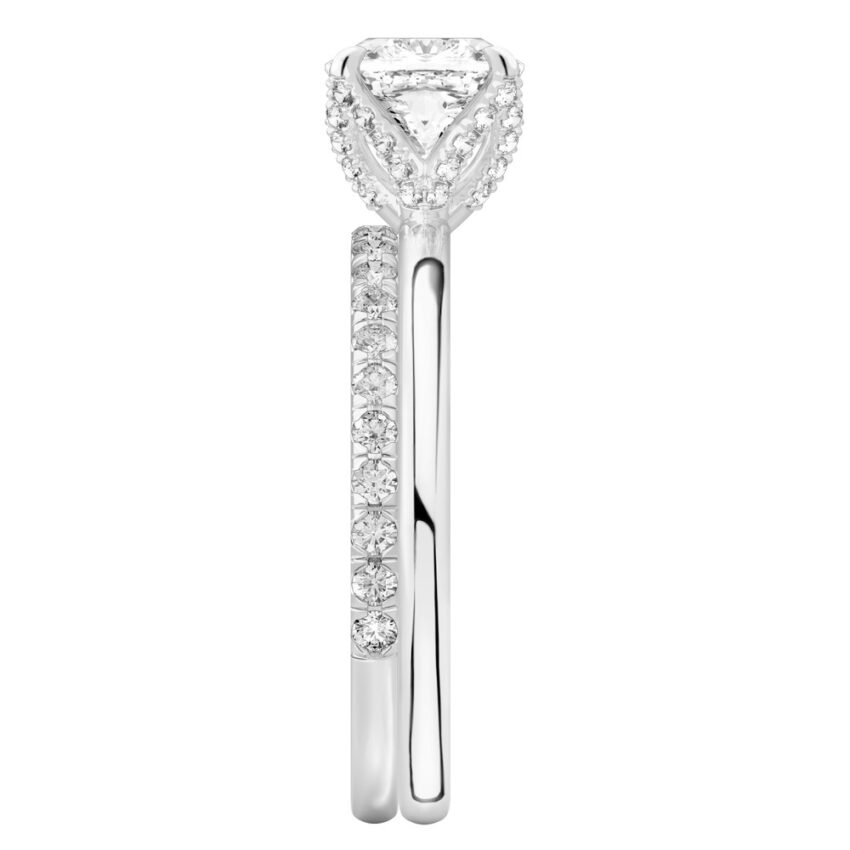 Side view of cushion cut diamond pave petal prong engagement ring set white gold