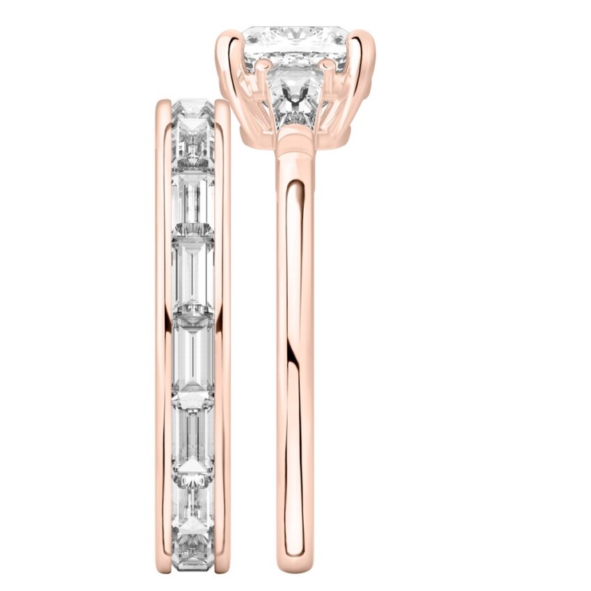 Side view of cushion cut diamond tapered baguette engagement ring set rose gold