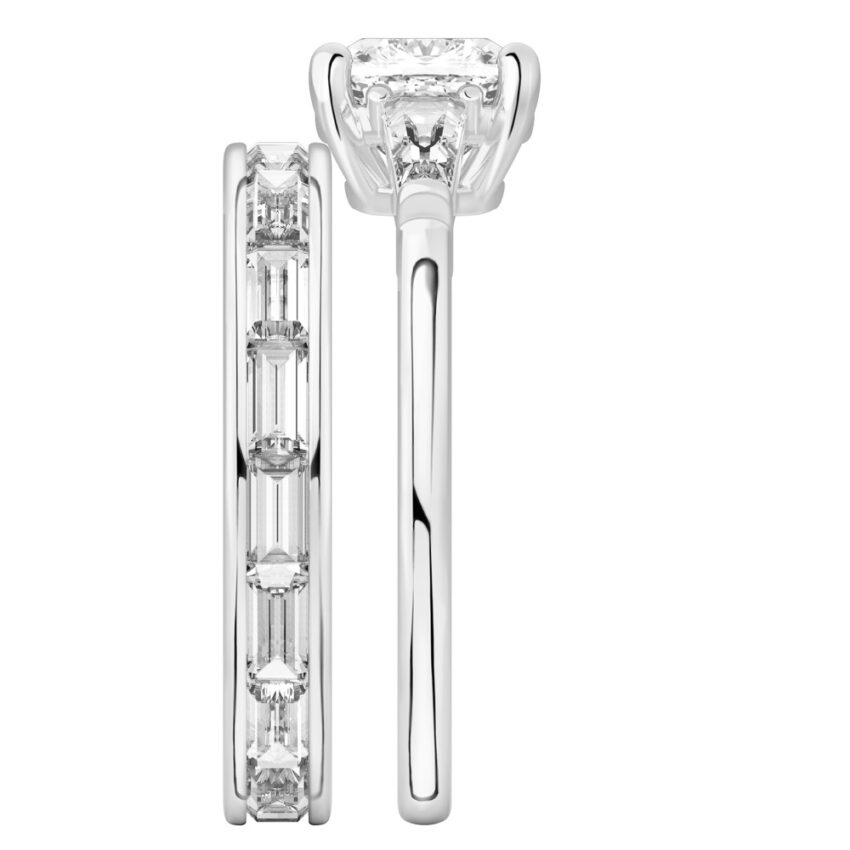 Side view of cushion cut diamond tapered baguette engagement ring set white gold