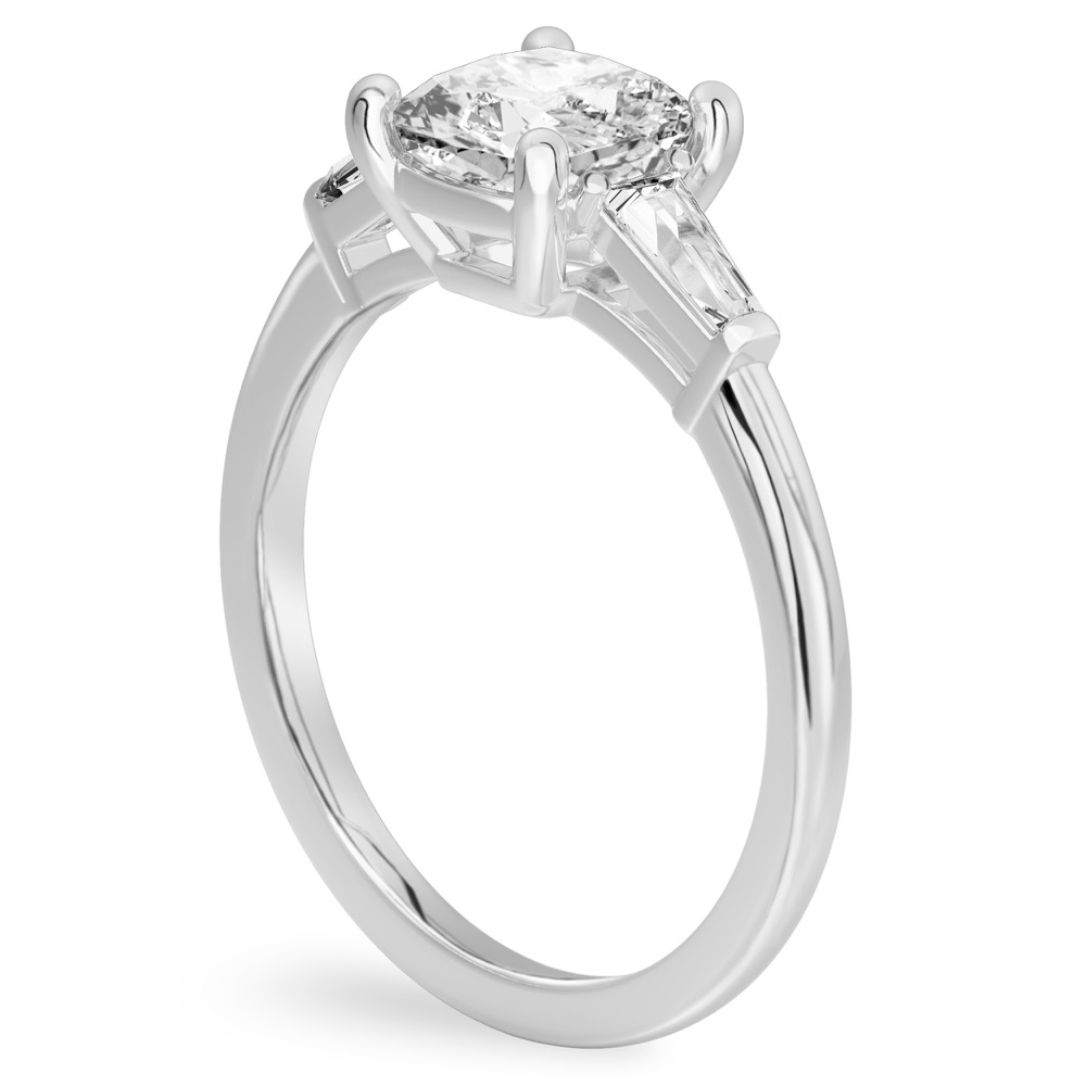 Angle view of cushion cut diamond tapered baguette engagement ring in white gold