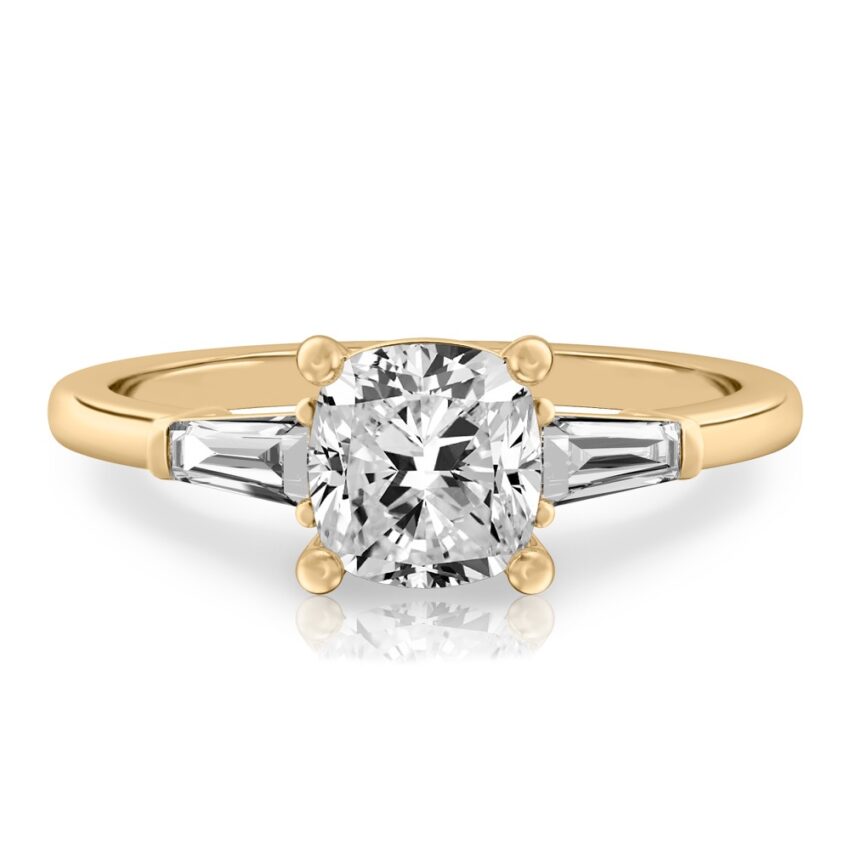 cushion cut diamond tapered baguette engagement ring in yellow gold