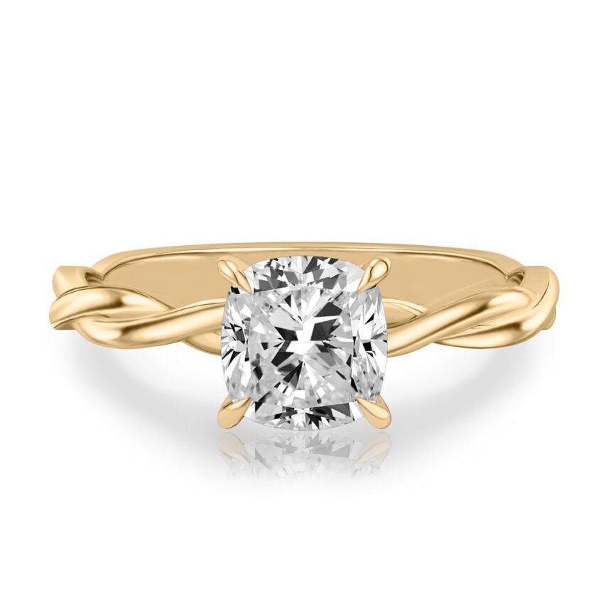 cushion cut diamond twisted hidden halo engagement ring in yellow gold