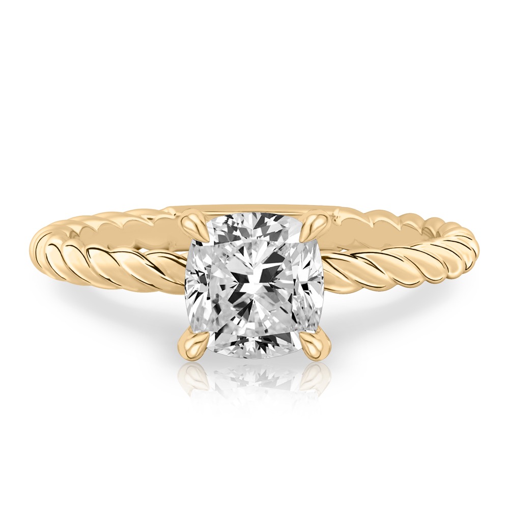 cushion cut diamond twisted rope engagement ring in yellow gold