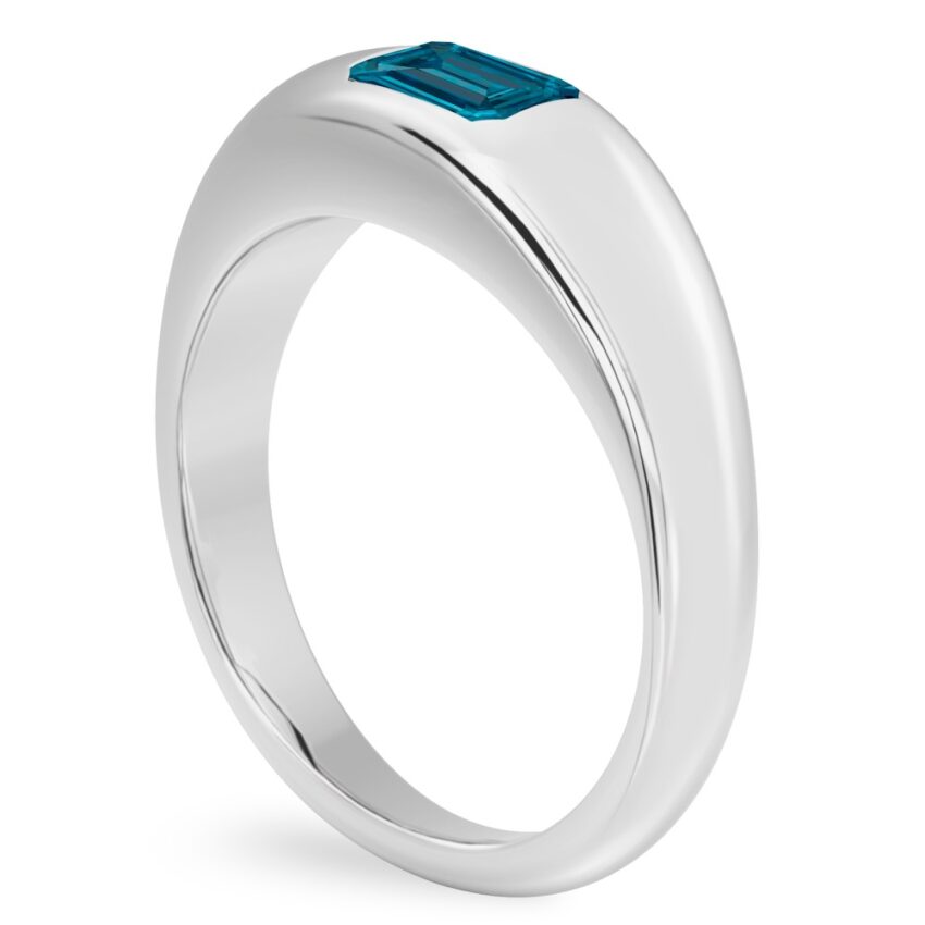 Angle view of emerald cut december birthstone dome ring platinum
