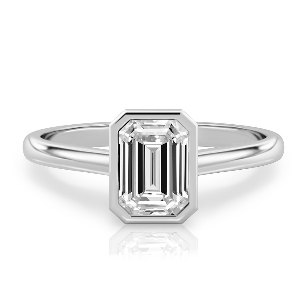 emerald cut diamond bezel engagement ring in platinum