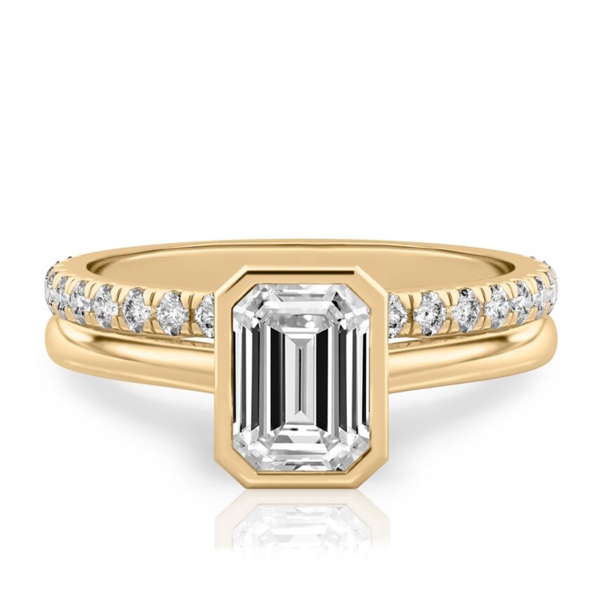 emerald cut diamond bezel engagement ring set yellow gold