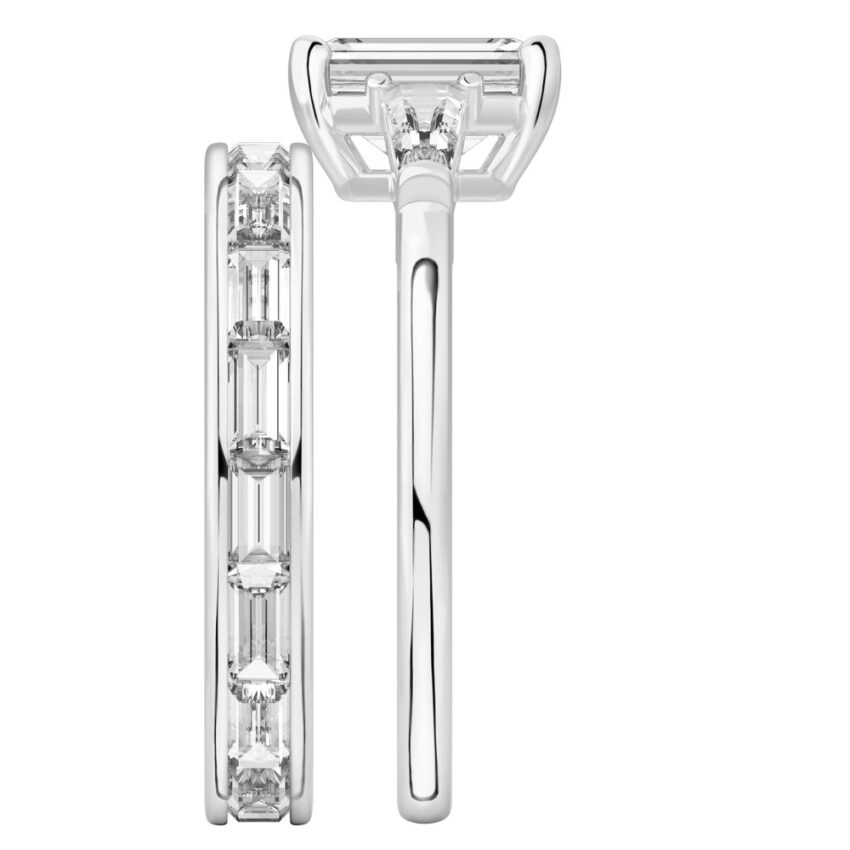 Side view of emerald cut diamond tapered baguette engagement ring set palladium