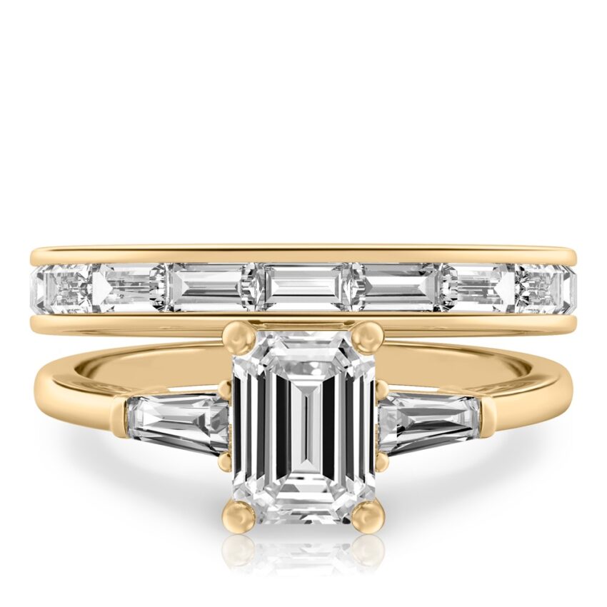 emerald cut diamond tapered baguette engagement ring set yellow gold