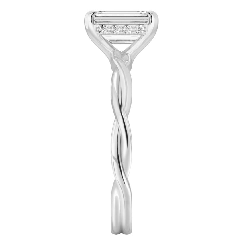Side view of emerald cut diamond twisted hidden halo engagement ring in white gold