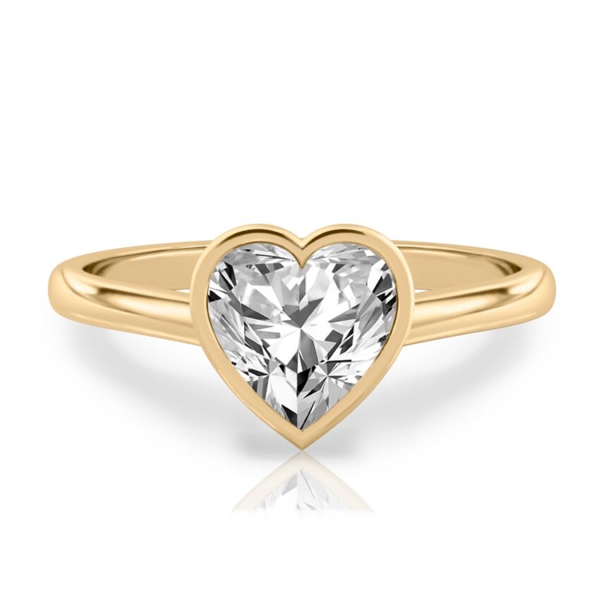 heart shape diamond bezel engagement ring in yellow gold