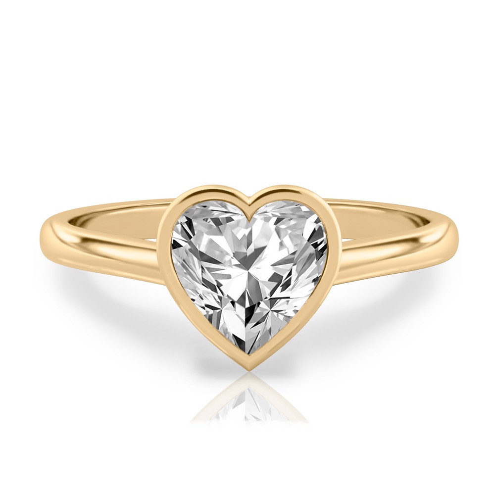 heart shape diamond bezel engagement ring in yellow gold