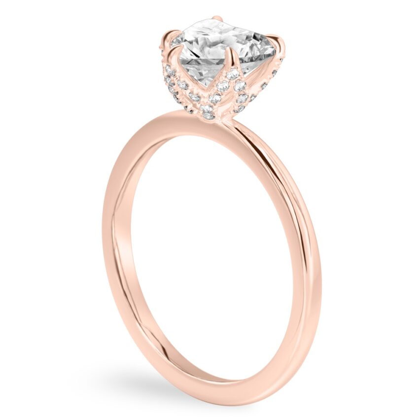 Angle view of heart shape diamond pave petal prong engagement ring in rose gold