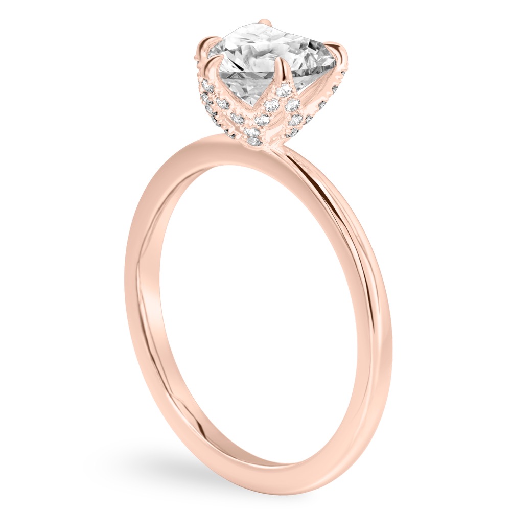 Angle view of heart shape diamond pave petal prong engagement ring in rose gold