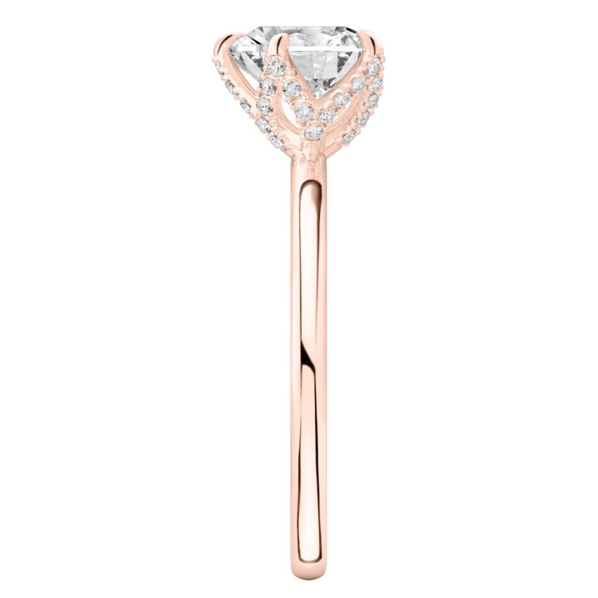 Side view of heart shape diamond pave petal prong engagement ring in rose gold