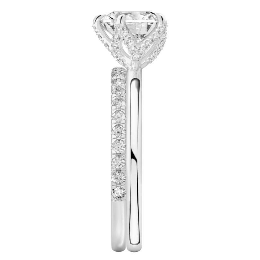 Side view of heart shape diamond pave petal prong engagement ring set palladium