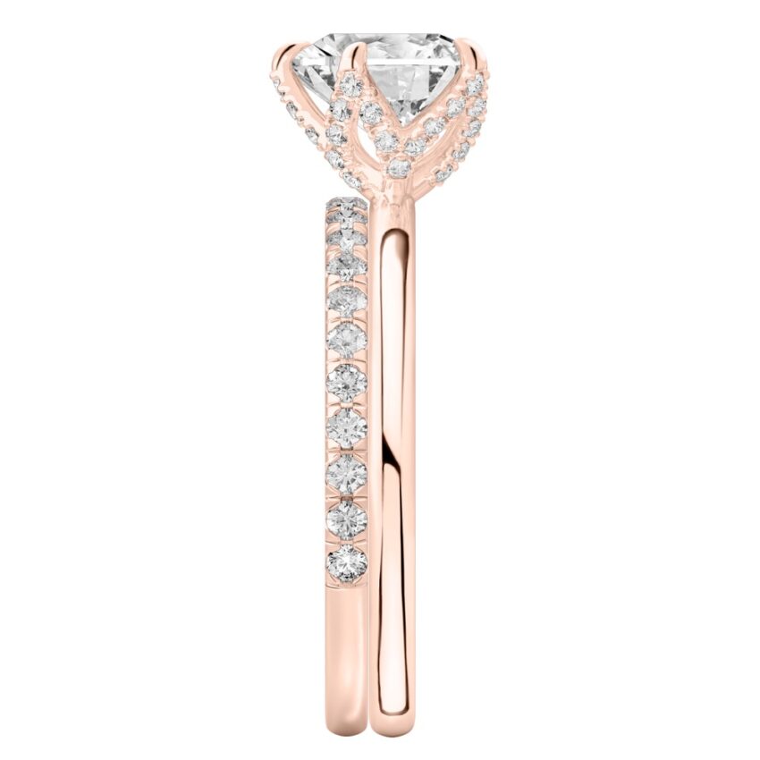 Side view of heart shape diamond pave petal prong engagement ring set rose gold