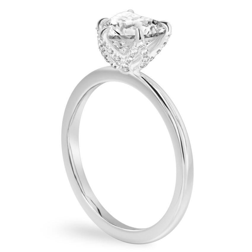 Angle view of heart shape diamond pave petal prong engagement ring in white gold