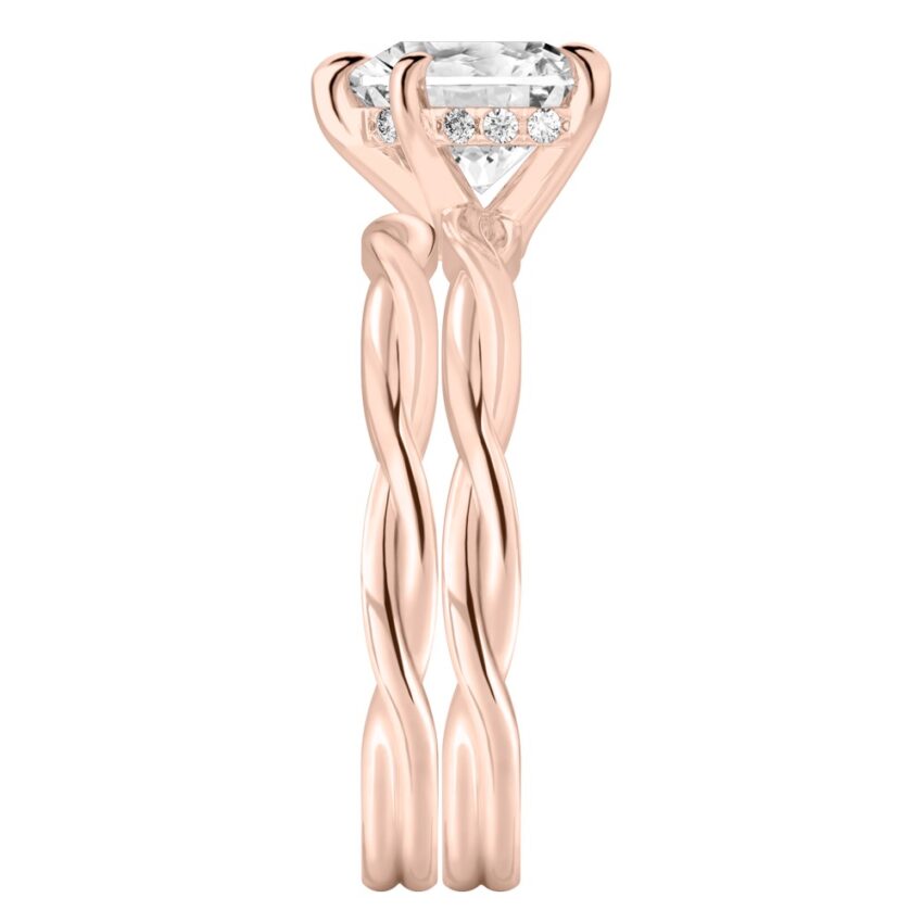 Side view of heart shape diamond twisted hidden halo engagement ring set rose gold