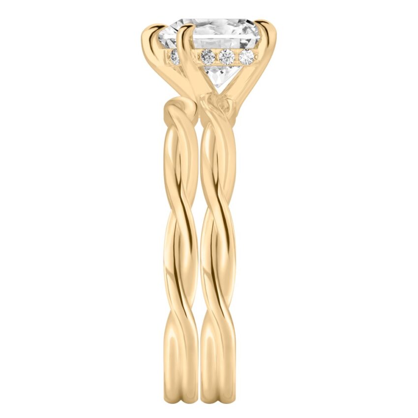 Side view of heart shape diamond twisted hidden halo engagement ring set yellow gold